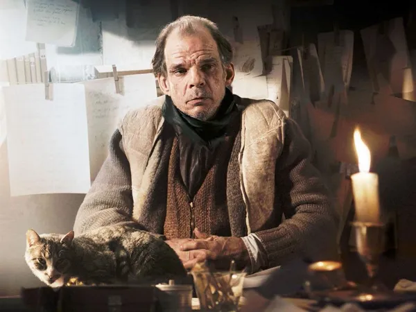 Denis Lavant as Louis-Ferdinand Céline with Bébert